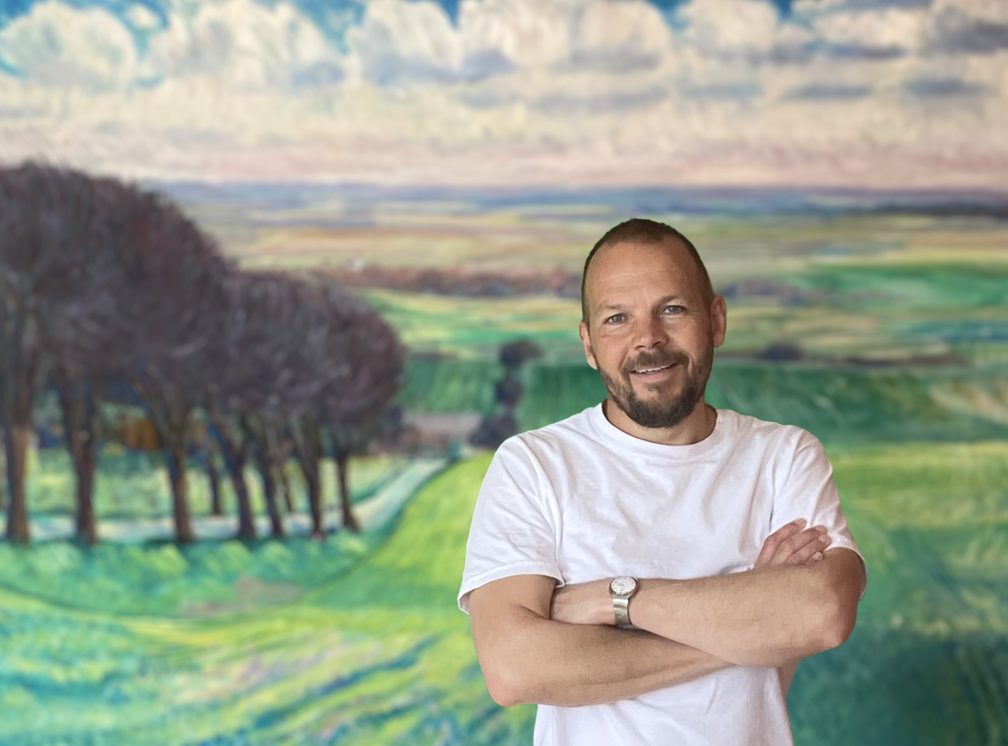 Mand foran maleri af landskab