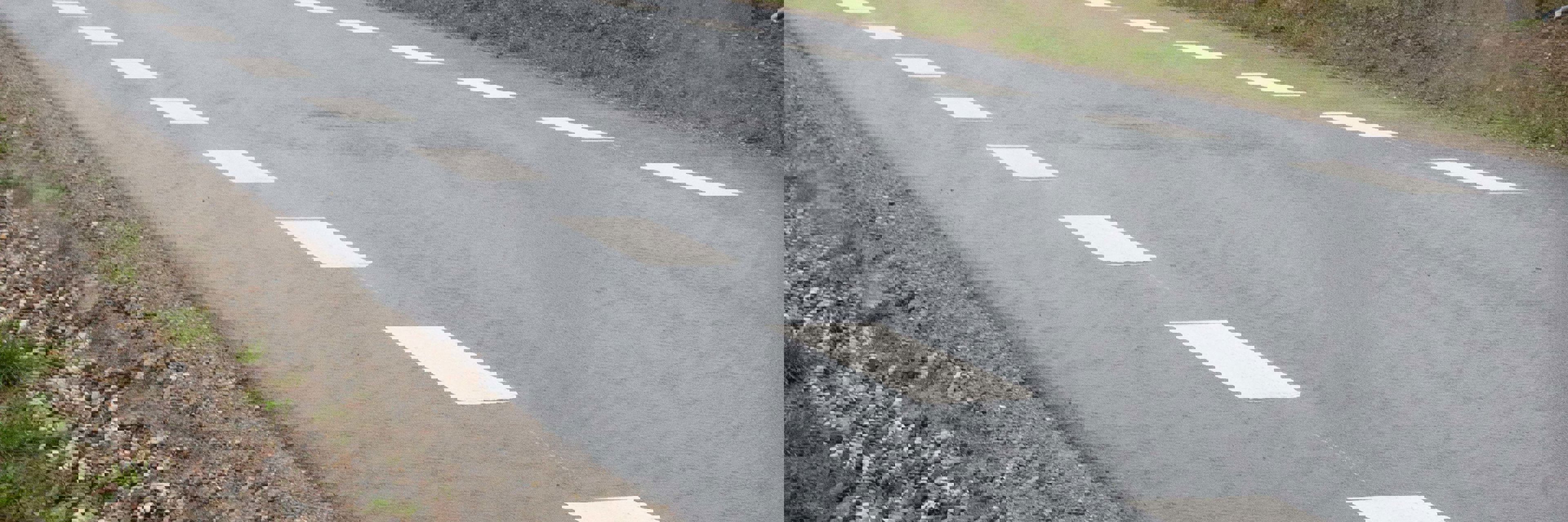 Vejbane med vandtårn i baggrunden